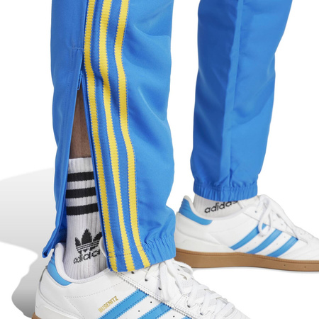 Spodnie dresowe męskie adidas WOVEN niebieskie IW3234