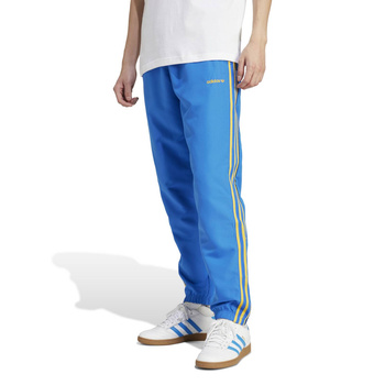 Spodnie dresowe męskie adidas WOVEN niebieskie IW3234