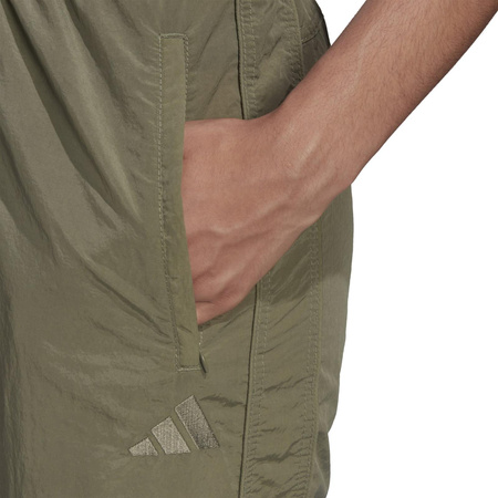 Spodnie damskie adidas WOVEN zielone FI6718