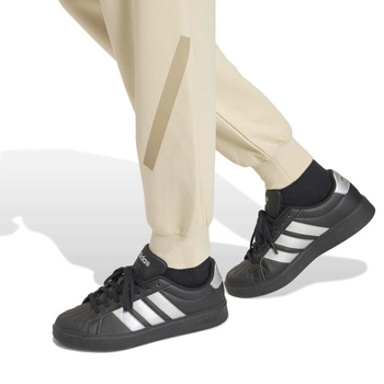 Spodnie dresowe damskie adidas Z.N.E. beżowe KC7713