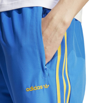 Spodnie dresowe męskie adidas WOVEN niebieskie IW3234
