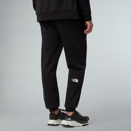 Spodnie dresowe męskie The North Face REAXION 2.0 czarne NF0A8DRSKS7