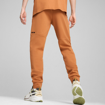 Spodnie dresowe męskie Puma RAD/CAL DK CL pomarańczowe 68162164