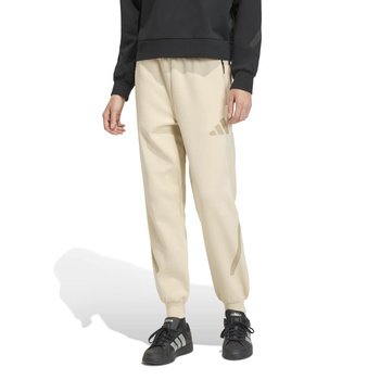 Spodnie dresowe damskie adidas Z.N.E. beżowe KC7713