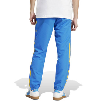Spodnie dresowe męskie adidas WOVEN niebieskie IW3234