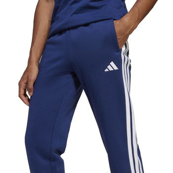 Spodnie dresowe dziecięce adidas ESSENTIALS niebieskie JY0603