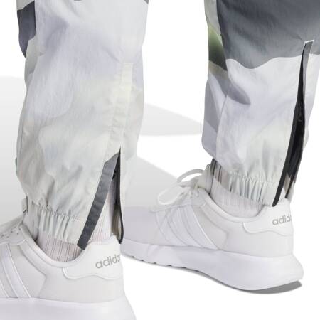 Spodnie dresowe damskie adidas CITY ESCAPE CAMO PRINT wielokolorowe IX3839