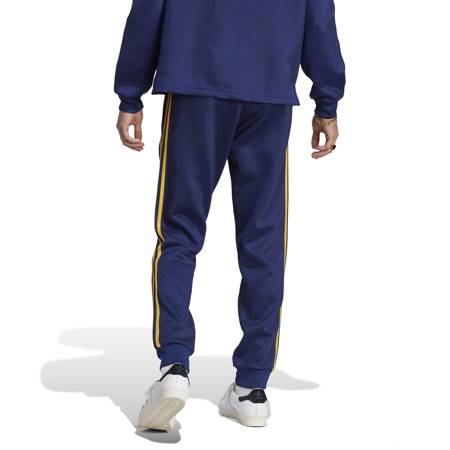 Spodnie dresowe męskie adidas ADICOLOR CLASSICS+ SST niebieskie IJ6998