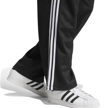 Spodnie dresowe męskie adidas ADICOLOR BAGGY FIT FIREBIRD czarne IZ4801